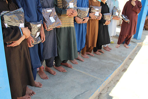 40 juveniles received local Afghan Clothes